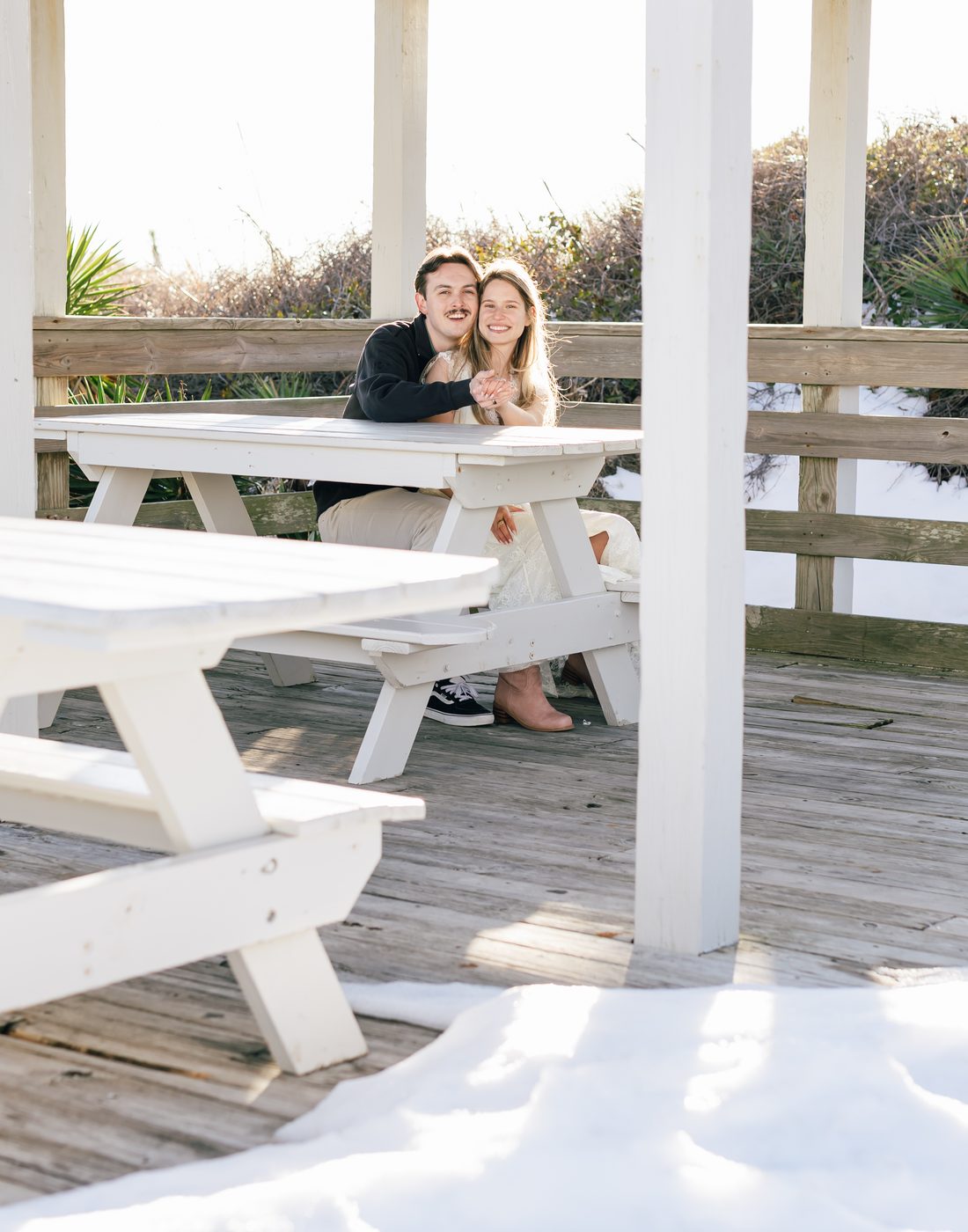 Catherine and Noah on a porch swing
